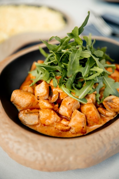 free-photo-chopped-chicken-breast-in-sauce-and-arugula