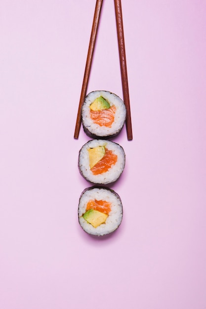 Chopsticks taking sushi | Free Photo