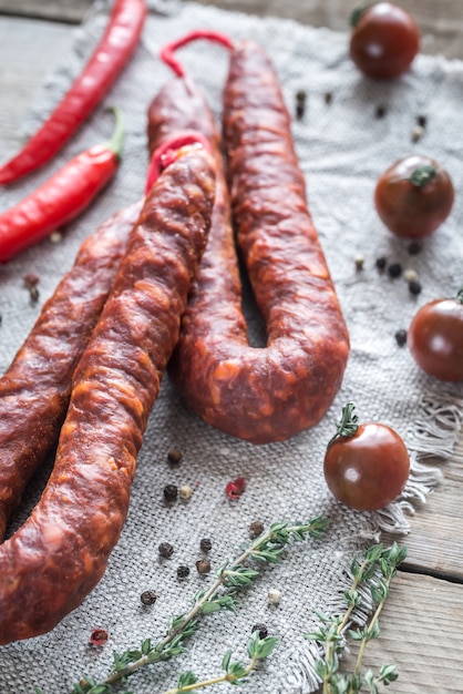 Premium Photo | Chorizo with cherry tomatoes