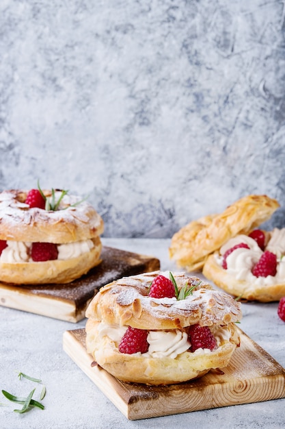 Premium Photo | Choux cake paris brest with raspberries