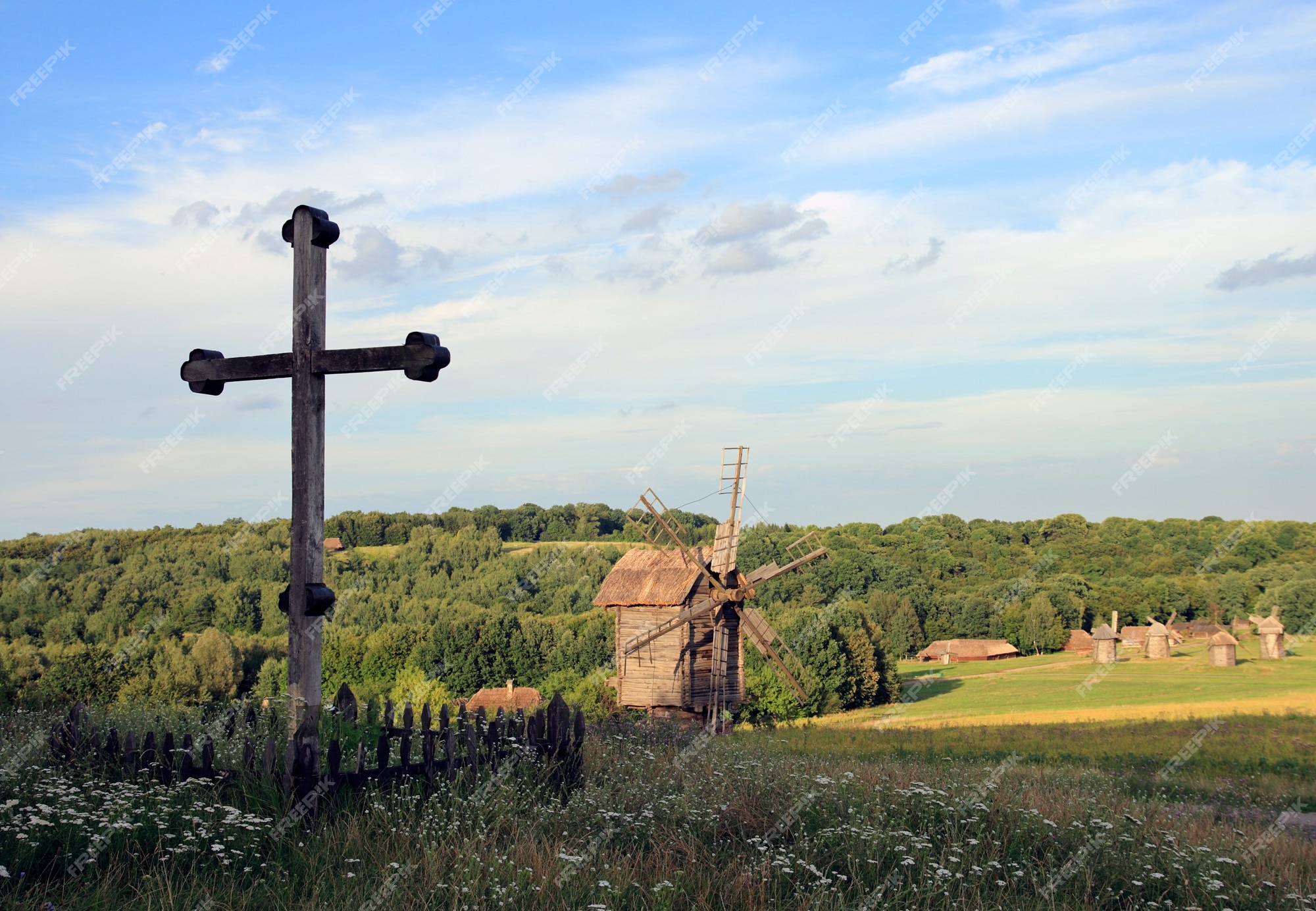 Premium Photo | Christian wood cross on grass overgrown hill