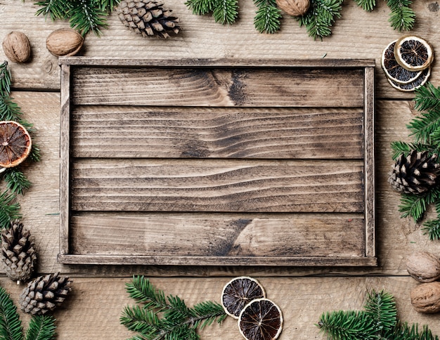 Premium Photo | Christmas background with christmas decor on rustic wood