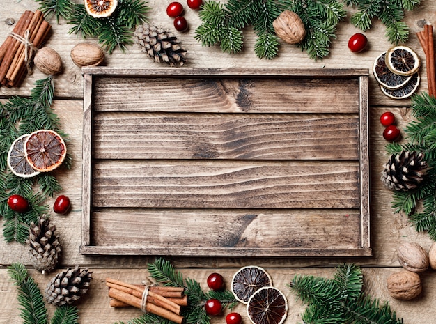 Download Premium Photo Christmas Background With Christmas Decor On Rustic Wood PSD Mockup Templates