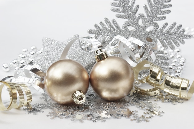 Christmas background with decorations in gold and silver Photo | Free ...