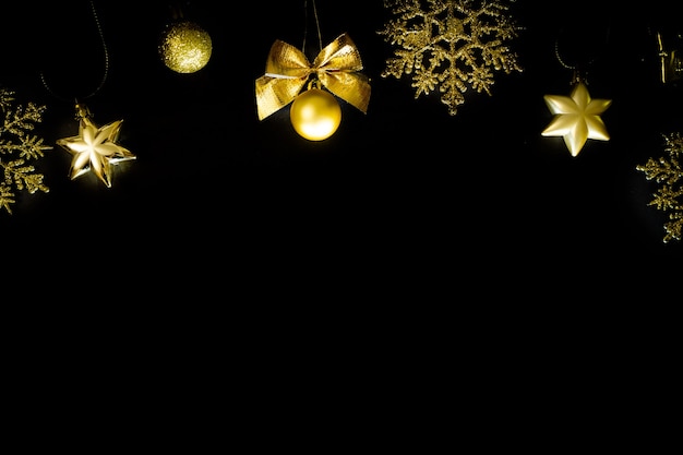 Premium Photo | Christmas black background gold decorations new year