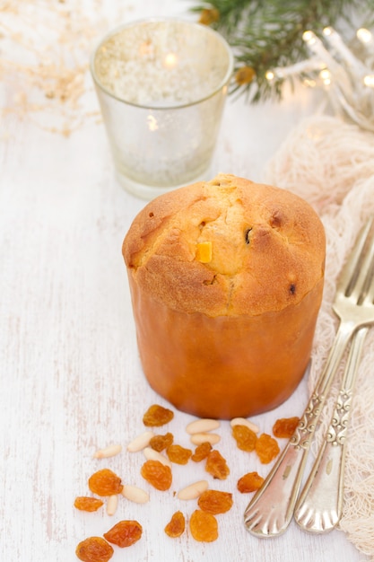 Premium Photo | Christmas cake panettone on wooden background