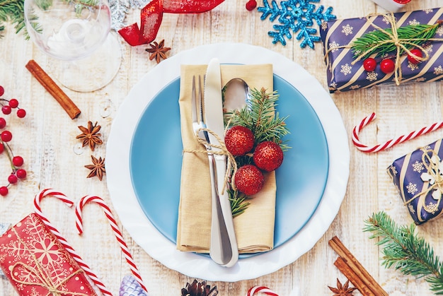 Christmas composition with table setting Premium Photo