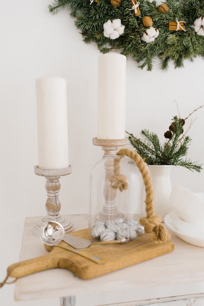 Premium Photo Christmas Decor In The Dining Room On The Table With Candles