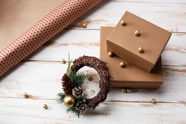 Free Photo | Christmas decoration and gift boxes over wooden table