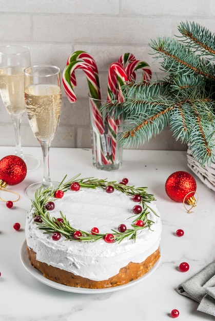 Christmas Fruit Cake Or Pudding Decorated With Rosemary And