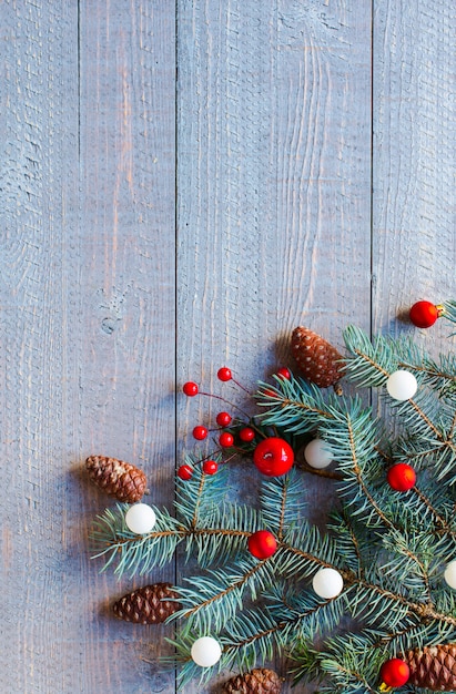 Premium Photo | Christmas holiday background with ornaments on rustic ...
