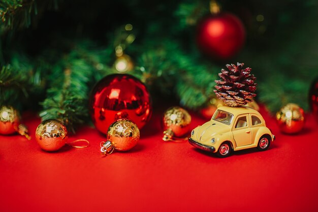 Premium Photo | Christmas ornaments on the red background