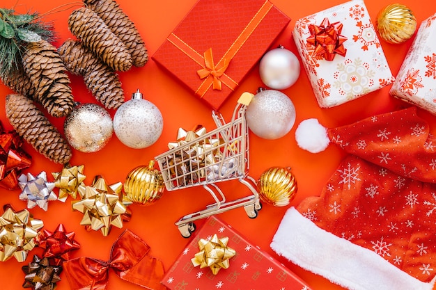 Free Photo | Christmas shopping concept with cart in middle