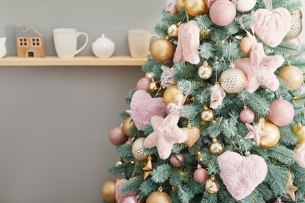 Download Premium Photo Christmas Sweets On Background Of Christmas Tree Pink Decorated Christmas Happy New Year Traditional New Year Dessert Copy Space PSD Mockup Templates