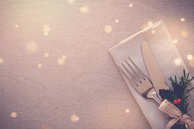 Premium Photo | Christmas table place setting, holidays dinner background
