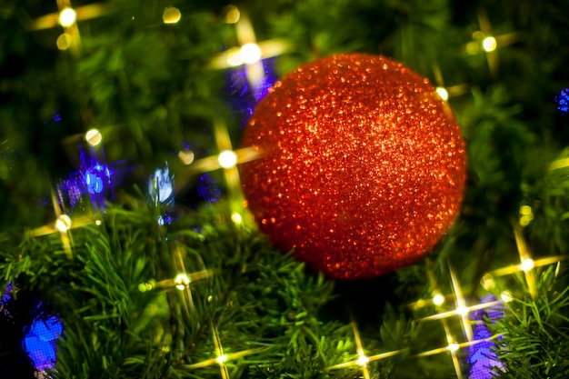 Premium Photo | Christmas tree decorations lit background