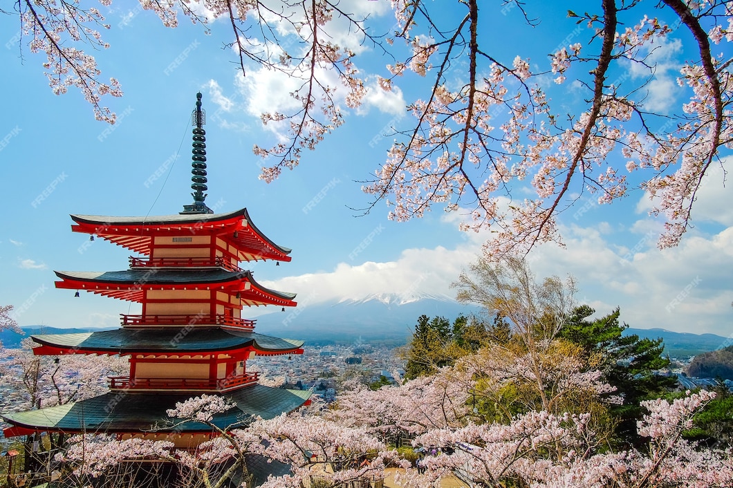 Premium Photo Chureito red pagoda with cherry blossom and mount fuji