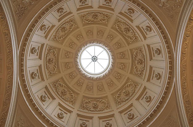 Premium Photo | Circular roof with window of old building in the city ...