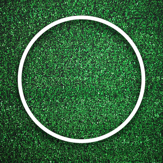 Circular white frame edge on green grass with shadow background. decoration background element concept Premium Photo