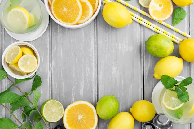 Citrus frame with straws Free Photo