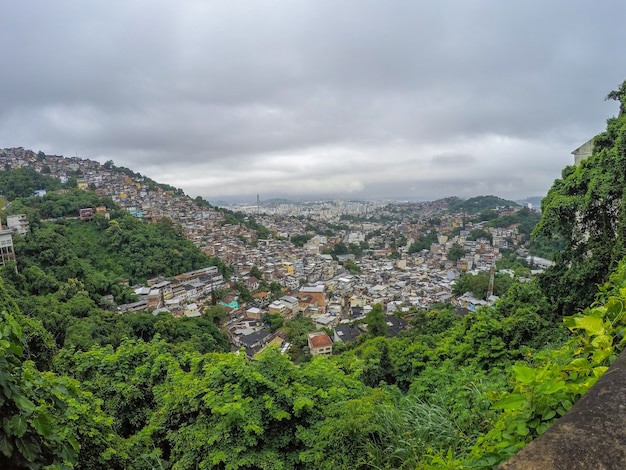City of rio de janeiro seen from the top of the neighborhood of santa tereza on a cloudy day. Premium Photo