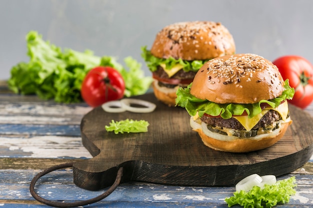 Premium Photo | Classic burger with beef patty, fresh lettuce, onions ...