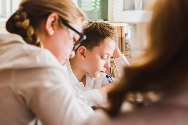 Free Photo | Classmates doing homework together