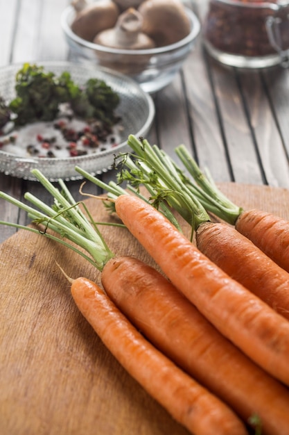 Free Photo | Clean carrots on board