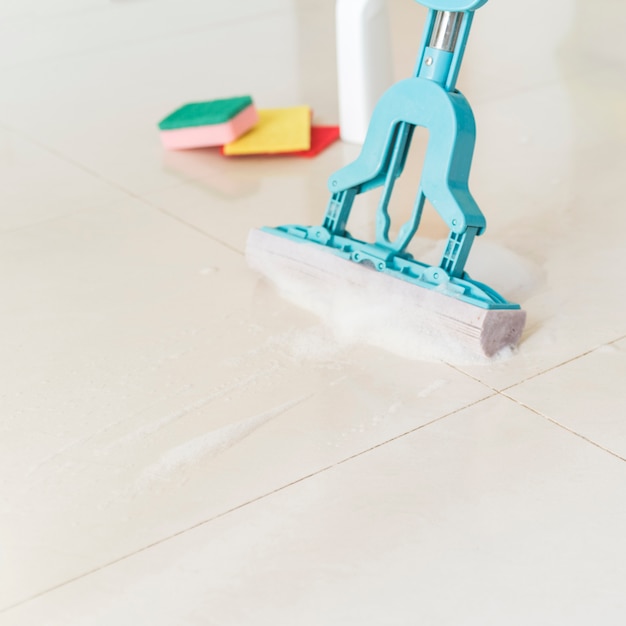 Cleaning concept with mop Free Photo