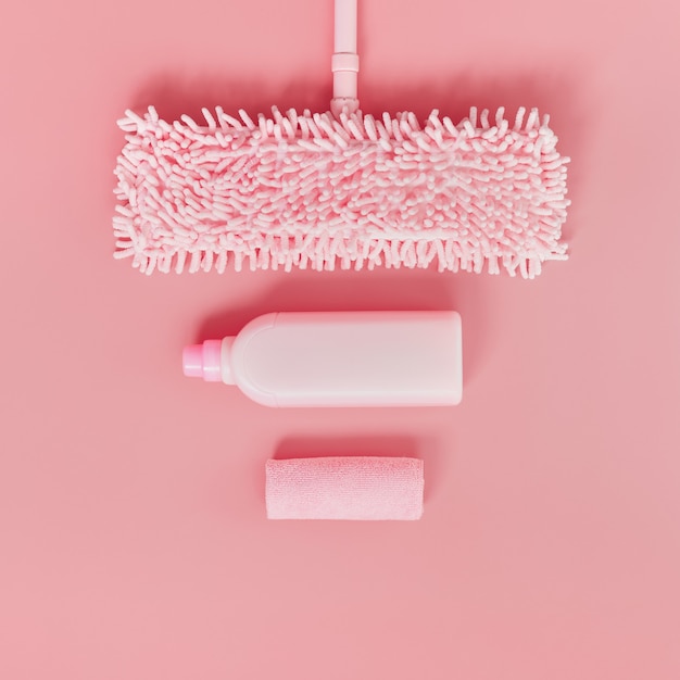 Premium Photo | Cleaning kit in the house pink on a pink background.