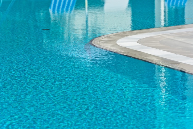 Premium Photo | Clear blue bright water in the swimming pool