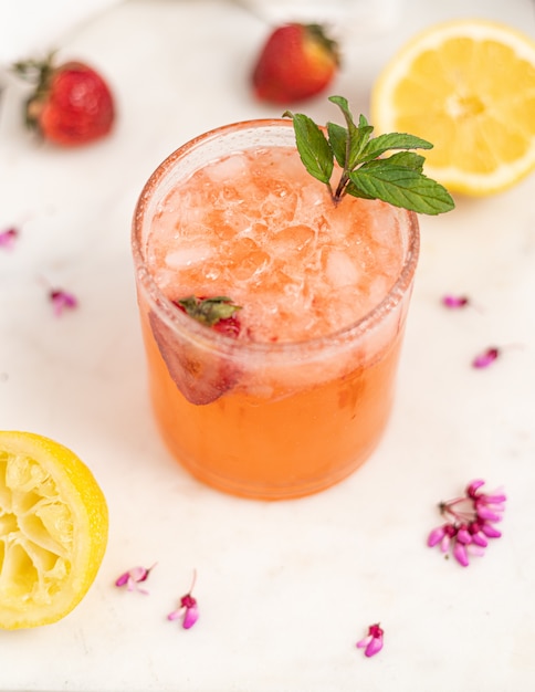 Free Photo | Clear drinking glass with orange liquid