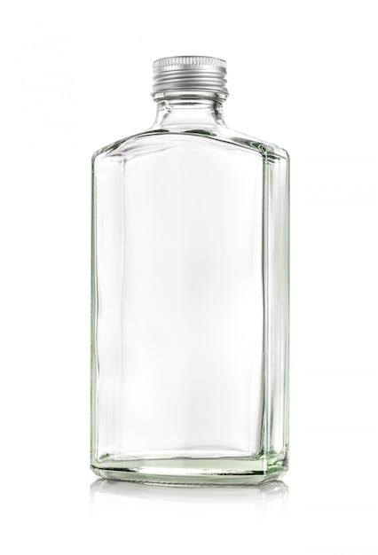 Premium Photo | Clear glass whiskey bottle isolated