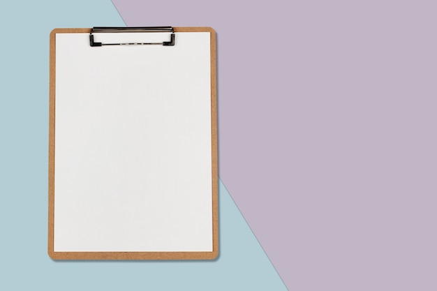 Premium Photo | Clipboard with white sheet on pastel color background ...