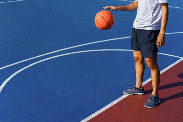 Premium Photo | Close of a man dribbling the ball