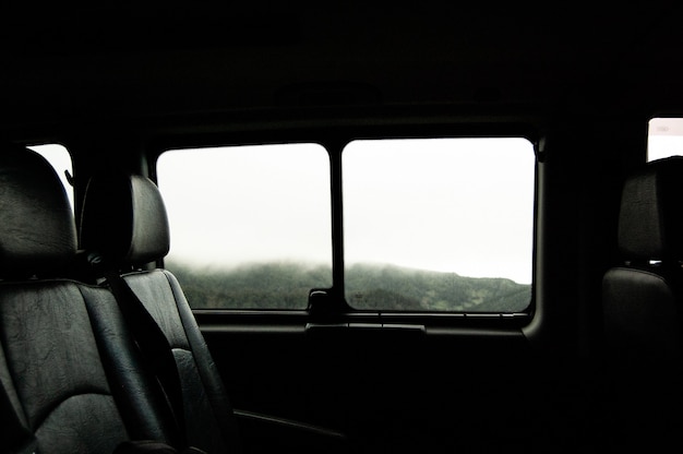Free Photo | Close-range shot of two car seat near the window inside of ...