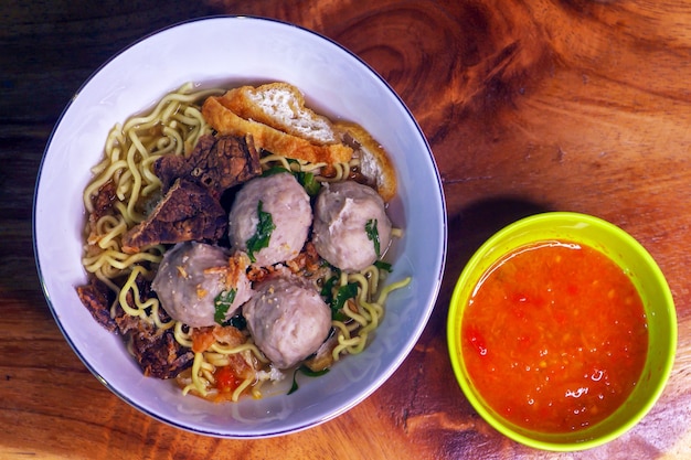 Premium Photo Close Up Of Bakso A Meatball With Noodles And Chili