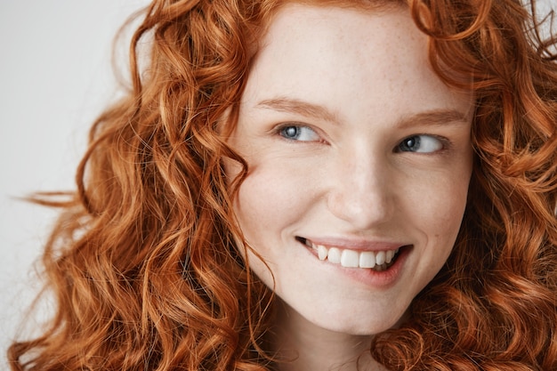 Close Up Of Beautiful Girl With Curly Red Hair And