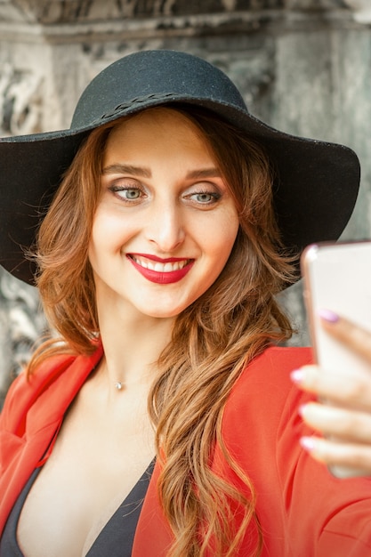 Premium Photo Close Up Of Beautiful Young Caucasian Woman Taking Selfie On Smartphone Standing 