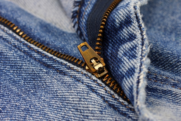 Premium Photo | Close-up blue jeans with zipper.