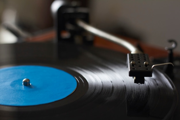 Premium Photo Close Up Of Blue Music Record On Turntable Turntable Needle Playing Music