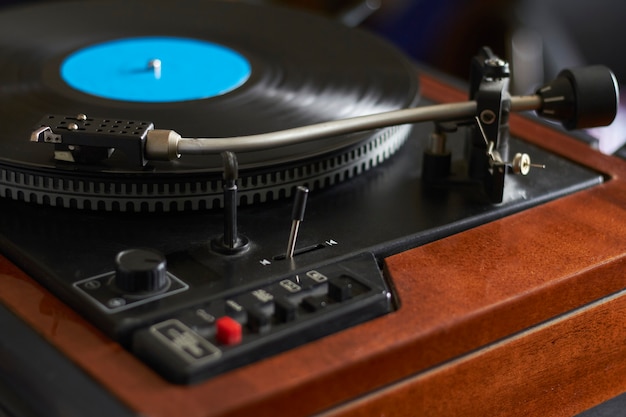 Premium Photo Close Up Of Blue Music Record On Turntable Turntable Needle Playing Music