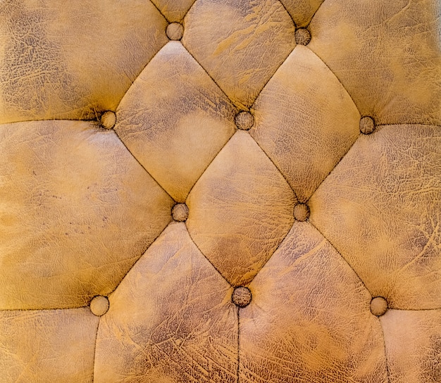 Premium Photo | Close up brown leather sofa texture background