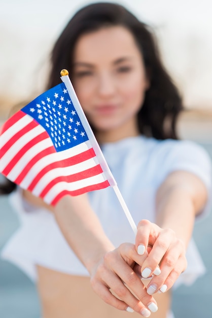 Free Photo | Close-up brunette woman holding usa flag in hands