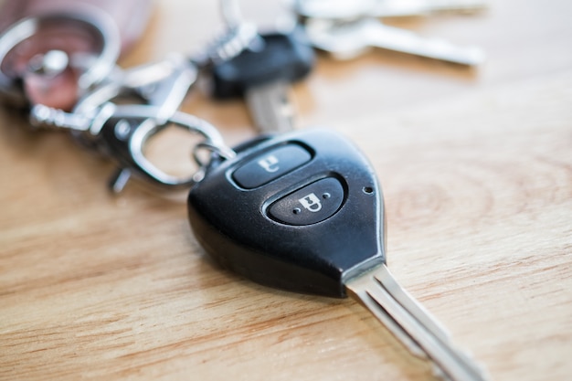 Premium Photo | Close up of car key on wood table