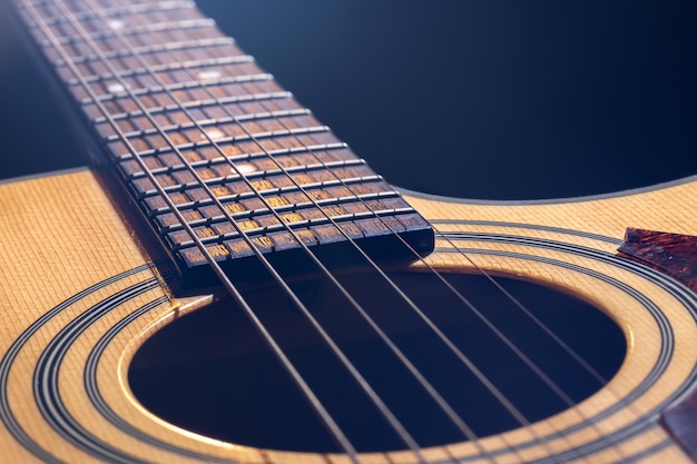 Premium Photo Close Up Of A Classical Acoustic Guitar On A Blurred