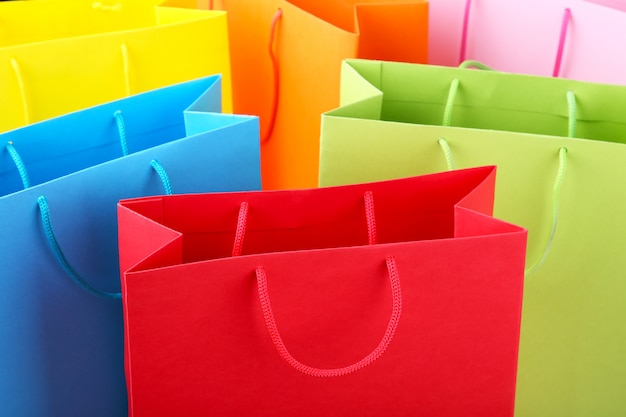 Premium Photo | Close up of colorful paper shopping bags