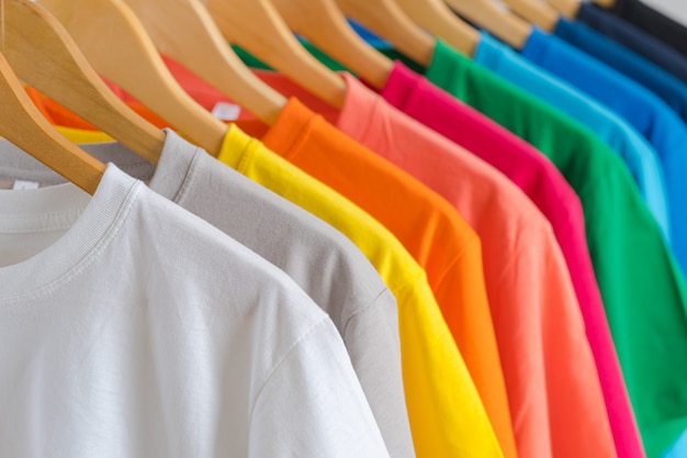 Premium Photo Close Up Of Colorful T Shirts On Hangers