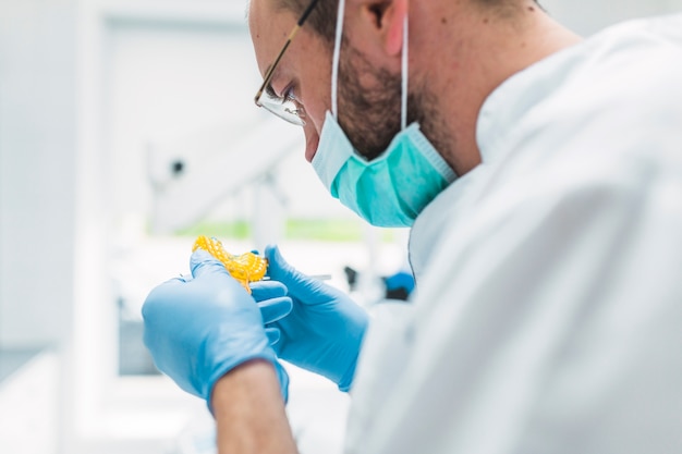 taking dental impression taking dental impression