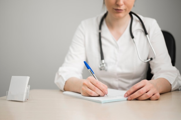 Premium Photo | Close-up Doctor Writing Prescription